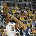 Penn State guard Jermaine Marshall tries to block a shot by Michigan guard Tim Hardaway Jr. Angela J. Cesere | AnnArbor.com