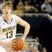 Michigan guard Matt Vogrich looks for a pass. Angela J. Cesere | AnnArbor.com