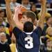 Penn State guard Trey Lewis tries to block a pass by Michigan forward Evan Smotrycz. Angela J. Cesere | AnnArbor.com