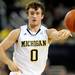 Michigan guard Zack Novak passes the ball. Angela J. Cesere | AnnArbor.com