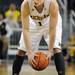 Michigan guard Stu Douglass looks for a pass. Angela J. Cesere | AnnArbor.com
