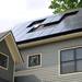 Solar panels on the home of John and Pamela Swerdlow, which shares a wall with Scott Phillips house, are similar to the panels on Phillps' home. Angela J. Cesere | AnnArbor.com