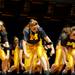 The Michigan dance team dressed up as football players while they danced through their performance. Angela J. Cesere | AnnArbor.com