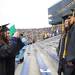 University of Michigan student Amy Goldberg, left, takes a photo of John Gnanaranjan, far right, and Anna Maurer before the 2012 commencement ceremony at Michigan Stadium. Angela J. Cesere | AnnArbor.com