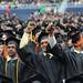 Soon to be University of Michigan graduates cheer from their seats during the commencement ceremony. Angela J. Cesere | AnnArbor.com