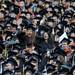 Students cheer from their seats during the commencement ceremony. Angela J. Cesere | AnnArbor.com