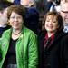 Eastern Michigan University President Susan Martin, left, stands with Washtenaw Community College President Rose Bellanca in the risers before President Obama's speech. Angela J. Cesere | AnnArbor.com
