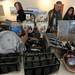 People browse tables of kitchen ware, equipment and decorations up for auction at the Parthenon on Wednesday morning. Angela J. Cesere | AnnArbor.com
