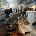 People browse tables of kitchen ware, equipment and decorations up for auction at the Parthenon on Wednesday morning. Angela J. Cesere | AnnArbor.com
