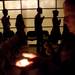 A congregation walks with candles while repeating the group chant of 'Peace to the world / Happiness to you / Love to the world / Wisdom to you' during the Zen Buddhist Temple's traditional New Year's Eve service in Ann Arbor. Chris Asadian | AnnArbor.com