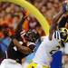 Michigan senior wide receiver Junior Hemingway reaches up over Virginia Tech linebacker Antone Exum for a touchdown in the first half during the Sugar Bowl in New Orleans, LA on Tuesday.  Melanie Maxwell I AnnArbor.com 