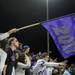 Pioneer senior Julia Rampton waves a Class of 2012 flag during the football game against Saline at Pioneer High School on Sept. 16, 2011. Angela J. Cesere | AnnArbor.com