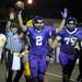 Saline running back Drake Johnson holds up the football in celebration of his touchdown during the football game against Saline at Pioneer High School on Sept. 16, 2011. Angela J. Cesere | AnnArbor.com