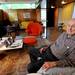 Robert Metcalf sits in the living room of his home which he designed on Arlington Ave. His home will be part of a tour on Sunday. Angela J. Cesere | AnnArbor.com