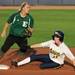 Michigan outfielder Lyndsay Doyle slides into second base as EMU second baseman Nellie Coquillard watches the ball. Angela J. Cesere | AnnArbor.com
