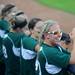 EMU junior Courtney Nicholson, right, claps for her teammates. Angela J. Cesere | AnnArbor.com
