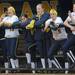 Michigan cheers for teammates up to bat against Penn State during a double header at Wilpon Softball Complex in Ann Arbor on Saturday afternoon. Angela J. Cesere | AnnArbor.com

