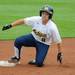 Michigan infielder Ashley Lane slides into 2nd base. Angela J. Cesere | AnnArbor.com
