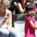 Ann Arbor resident Emily Feng, right, age 3, dances to music as her nanny, Stephanie Southwell, left, takes a photo during Sonic Lunch. Angela J. Cesere | AnnArbor.com