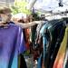 Kate Beck rearranges her clothing line at her booth on South University at Ann Arbor's South University Art Fair. Angela J. Cesere | AnnArbor.com 