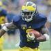 Michigan junior quarter back Devin Gardner runs the ball. Angela J. Cesere | AnnArbor.com

