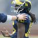 Michigan senior quarter back Denard Robinson talks on the sidelines during the spring game.  Angela J. Cesere | AnnArbor.com
