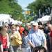 A large crowd mills down Main St. at the Ann Arbor Summer Art Fair on Friday morning. Angela J. Cesere | AnnArbor.com 