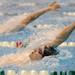 Huron's James Riegger competes in the championship heat of the boys 100 yard backstroke at the MHSAA swim and dive chapionships at Eastern Michigan University. Angela J. Cesere | AnnArbor.com
