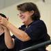 Saline resident Lynn Boland, whose son David is on the Saline swim team, cheers for the team during the MHSAA swim and dive chapionships at Eastern Michigan University. Angela J. Cesere | AnnArbor.com
