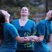 From left: Elyse Brogdon, Jordan Ruch, and Michelle Chirby of the University of Michigan student dance group, Cadence, perform in the Diag for the Take Back the Night rally in Ann Arbor. Angela J. Cesere | AnnArbor.com
