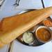 Clockwise from top: a paper masala dosa with tomato chutney, sambar, and coconut chutney at Taste of India Suvai. Angela J. Cesere | AnnArbor.com
