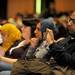 University of Michigan medical student Hasan Siddiqi, far right, takes video of Tawakkul Karman during her speech. Angela J. Cesere | AnnArbor.com