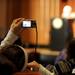An audience member takes video of Tawakkul Karman during her speech. Angela J. Cesere | AnnArbor.com