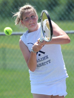 Saline's Heather Vogt hits the ball in the 3 singles match against Pioneer's Diya Malhotra at a tournament at Pioneer High School on Wednesday afternoon. Angela J. Cesere | AnnArbor.com