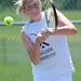Saline's Heather Vogt hits the ball in the 3 singles match against Pioneer's Diya Malhotra at a tournament at Pioneer High School on Wednesday afternoon. Angela J. Cesere | AnnArbor.com