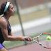 Pioneer's Diya Malhotra hits the ball in the 3 singles match against Saline's Heather Vogt at a tournament at Pioneer High School on Wednesday afternoon. Angela J. Cesere | AnnArbor.com
