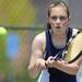 Saline's Julia Prisby prepares to hit the ball in the 2 doubles match against Huron at a tournament at Pioneer High School on Wednesday afternoon. Angela J. Cesere | AnnArbor.com