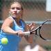 Skyline's Emma Whitaker prepares to hit the ball in the 3 singles match against Monroe at a tournament at Pioneer High School on Wednesday afternoon. Angela J. Cesere | AnnArbor.com