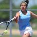 Skyline's Danielle Mitroi hits the ball in the 1 singles match against Saline's Mary Hanna at a tournament at Pioneer High School on Wednesday afternoon. Angela J. Cesere | AnnArbor.com