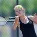 Pioneer's Alexa Ardvison prepares to hit the ball in the 1 doubles match against Huron at a tournament at Pioneer High School on Wednesday afternoon. Angela J. Cesere | AnnArbor.com
