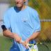 Skyline's Nate Wegryn hits the ball during a 1st doubles match against Canton at the tennis regionals at Pioneer High School on Oct. 7, 2011. Angela J. Cesere | AnnArbor.com