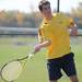 Saline's Kenny Viera hits the ball during the 3rd doubles match against Canton at the tennis regionals at Pioneer High School on Oct. 7, 2011. Angela J. Cesere | AnnArbor.com