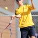 Saline's Donovan Main competes in the 1st doubles semi-finals against Pioneer during tennis regionals at Pioneer High School on Oct. 7, 2011. Angela J. Cesere | AnnArbor.com