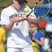 Pioneer's Scott Lieberman competes in the 1st doubles semi-finals against Saline during tennis regionals at Pioneer High School on Oct. 7, 2011. Angela J. Cesere | AnnArbor.com