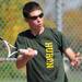 Huron's Costa Demetral competes in the 4th doubles semi-finals against Salem during tennis regionals at Pioneer High School on Oct. 7, 2011. Angela J. Cesere | AnnArbor.com 