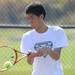 Huron's Yeon-Woo Chung competes in the 4th singles semi-finals against Skyline's Ryan Jackson during tennis regionals at Pioneer High School on Oct. 7, 2011. Angela J. Cesere | AnnArbor.com