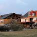 Houses were damaged and trees uprooted on Noble Dr. in Dexter after a tornado hit.  Angela J. Cesere | AnnArbor.com
