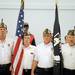 From left: Ypsilanti AMVETS Post 269 color guard members Charles Herndon, Terry Lamb, Louis Vaughn, and Pete Raymond carry the American and POW flags to the front of the gym at the beginning of the ceremony to honor veterans. Angela J. Cesere | AnnArbor.com