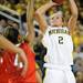 Ohio State guard Tayler Hill tries to block a shot by Michigan guard Courtney Boylan. Angela J. Cesere | AnnArbor.com