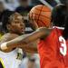 Ohio State guard Amber Stokes, right, tries to prevent Michigan forward Nya Jordan from passing the ball. Angela J. Cesere | AnnArbor.com